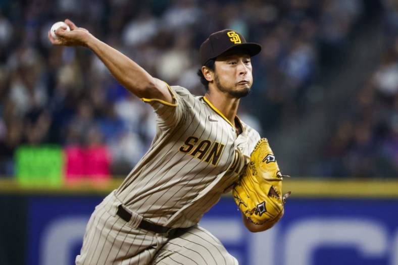 Sep 13, 2022; Seattle, Washington, USA; San Diego Padres starting pitcher Yu Darvish (11) throws against the Seattle Mariners during the third inning at T-Mobile Park. Mandatory Credit: Joe Nicholson-USA TODAY Sports
