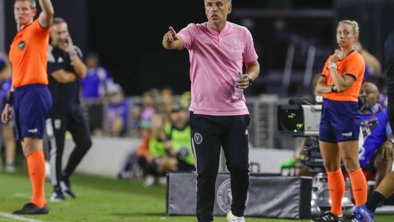 Sep 13, 2022; Fort Lauderdale, Florida, USA; Inter Miami CF head coach Phil Neville watches from the sideline during the second half against the Columbus Crew at DRV PNK Stadium. Mandatory Credit: Sam Navarro-USA TODAY Sports