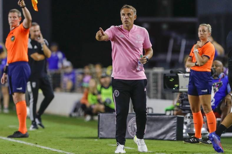 Sep 13, 2022; Fort Lauderdale, Florida, USA; Inter Miami CF head coach Phil Neville watches from the sideline during the second half against the Columbus Crew at DRV PNK Stadium. Mandatory Credit: Sam Navarro-USA TODAY Sports