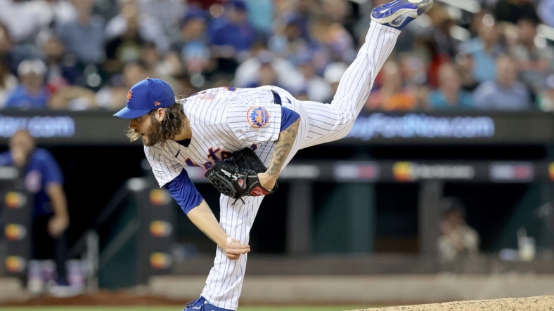 Sep 14, 2022; New York City, New York, USA; New York Mets relief pitcher Trevor Williams (29) follows through on a pitch against the Chicago Cubs during the fifth inning at Citi Field. Mandatory Credit: Brad Penner-USA TODAY Sports