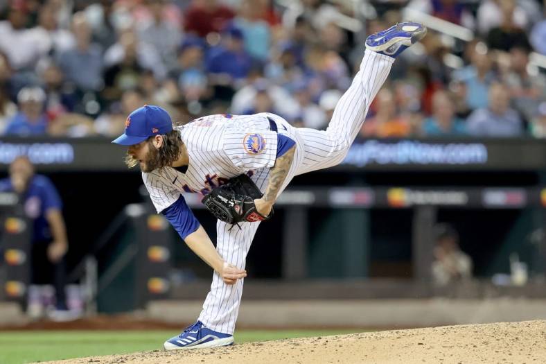 Sep 14, 2022; New York City, New York, USA; New York Mets relief pitcher Trevor Williams (29) follows through on a pitch against the Chicago Cubs during the fifth inning at Citi Field. Mandatory Credit: Brad Penner-USA TODAY Sports