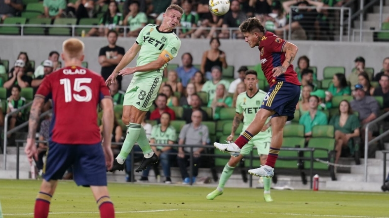 Sep 14, 2022; Austin, Texas, USA; Austin FC midfielder Alexander Ring (8) and Real Salt Lake midfielder Diego Luna (26) battle for the ball during the first half at Q2 Stadium. Mandatory Credit: Scott Wachter-USA TODAY Sports