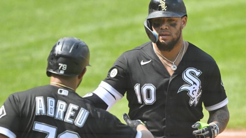 Sep 15, 2022; Cleveland, Ohio, USA; Chicago White Sox third baseman Yoan Moncada (10) celebrates his solo home run with first baseman Jose Abreu (79) in the third inning against the Cleveland Guardians at Progressive Field. Mandatory Credit: David Richard-USA TODAY Sports