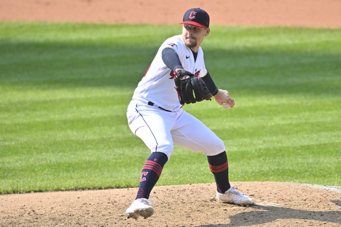 Sep 15, 2022; Cleveland, Ohio, USA; Cleveland Guardians relief pitcher Kirk McCarty (59) delivers a pitch in the ninth inning against the Chicago White Sox at Progressive Field. Mandatory Credit: David Richard-USA TODAY Sports