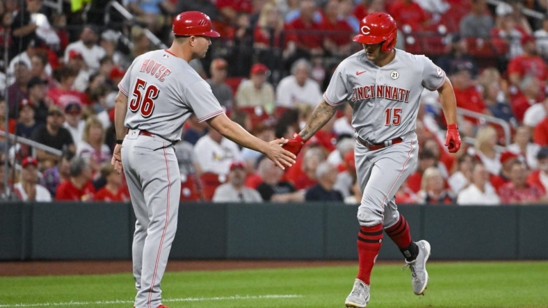 Sep 15, 2022; St. Louis, Missouri, USA;  Cincinnati Reds center fielder Nick Senzel (15) is congratulated by third base J.R. House (56) after hitting a solo home run against the St. Louis Cardinals during the second inning at Busch Stadium. Mandatory Credit: Jeff Curry-USA TODAY Sports