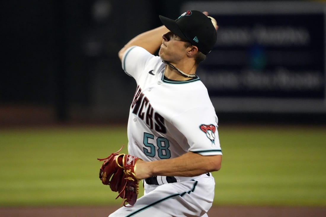 Sep 15, 2022; Phoenix, Arizona, USA; Arizona Diamondbacks starting pitcher Drey Jameson (58) pitches against the San Diego Padres during the first inning of his first career MLB start at Chase Field. Mandatory Credit: Joe Camporeale-USA TODAY Sports