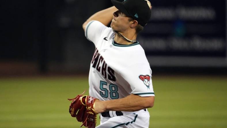 Sep 15, 2022; Phoenix, Arizona, USA; Arizona Diamondbacks starting pitcher Drey Jameson (58) pitches against the San Diego Padres during the first inning of his first career MLB start at Chase Field. Mandatory Credit: Joe Camporeale-USA TODAY Sports