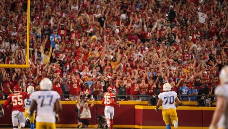 Sep 15, 2022; Kansas City, Missouri, USA; Kansas City Chiefs cornerback Jaylen Watson (35) runs for a touchdown after an interception against the Los Angeles Chargers during the second half at GEHA Field at Arrowhead Stadium. Mandatory Credit: Jay Biggerstaff-USA TODAY Sports