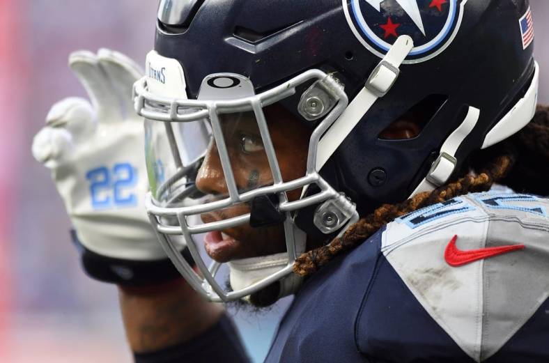 Sep 11, 2022; Nashville, Tennessee, USA; Tennessee Titans running back Derrick Henry (22) leaves the field after a stop by the New York Giants during the second half at Nissan Stadium. Mandatory Credit: Christopher Hanewinckel-USA TODAY Sports