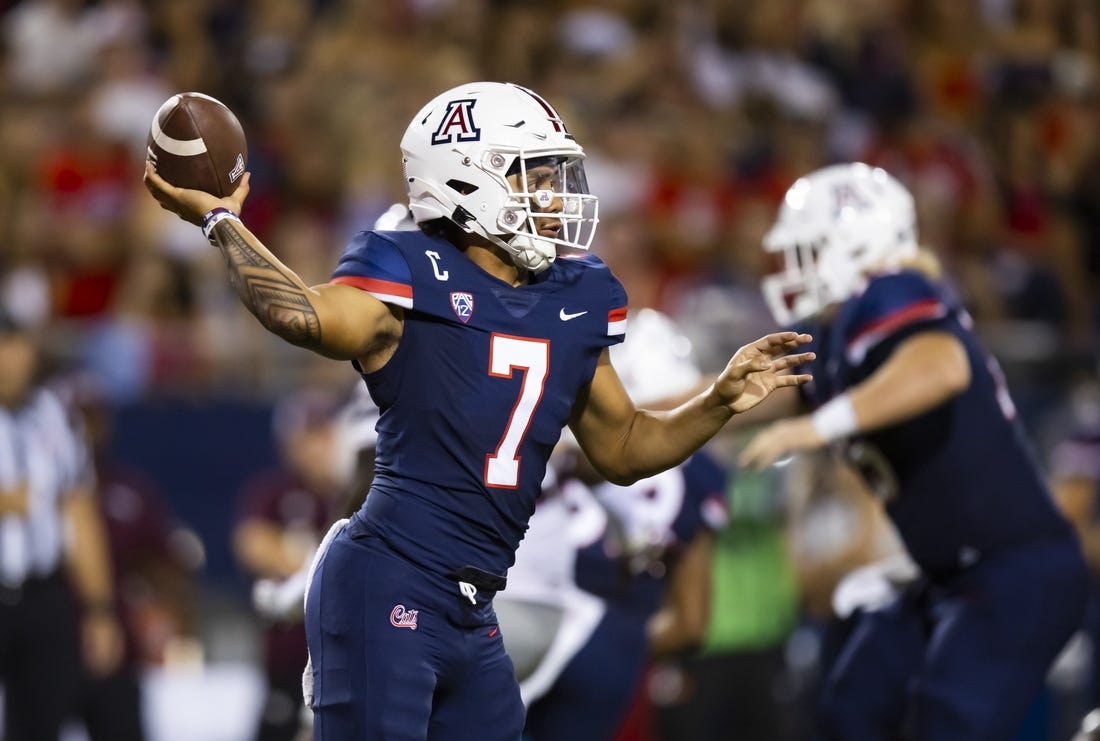 Sep 10, 2022; Tucson, Arizona, USA; Arizona Wildcats quarterback Jayden de Laura (7) against the Mississippi State Bulldogs at Arizona Stadium. Mandatory Credit: Mark J. Rebilas-USA TODAY Sports