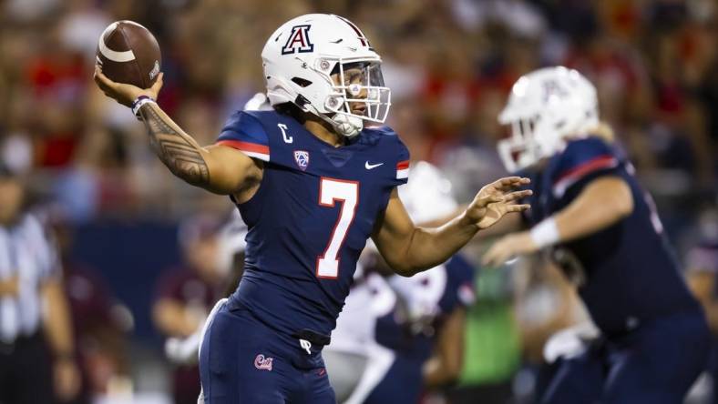 Sep 10, 2022; Tucson, Arizona, USA; Arizona Wildcats quarterback Jayden de Laura (7) against the Mississippi State Bulldogs at Arizona Stadium. Mandatory Credit: Mark J. Rebilas-USA TODAY Sports