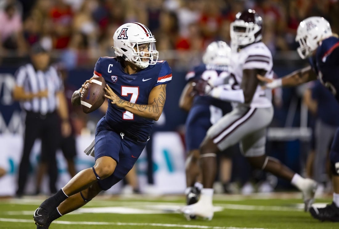 Sep 10, 2022; Tucson, Arizona, USA; Arizona Wildcats quarterback Jayden de Laura (7) against the Mississippi State Bulldogs at Arizona Stadium. Mandatory Credit: Mark J. Rebilas-USA TODAY Sports