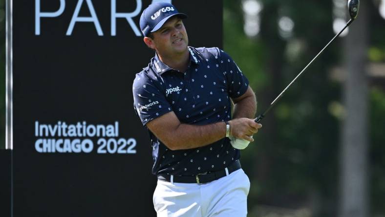 Sep 16, 2022; Chicago, Illinois, USA; Patrick Reed tees off from the 12th tee box during the first round of a LIV Golf tournament at Rich Harvest Farms. Mandatory Credit: Jamie Sabau-USA TODAY Sports