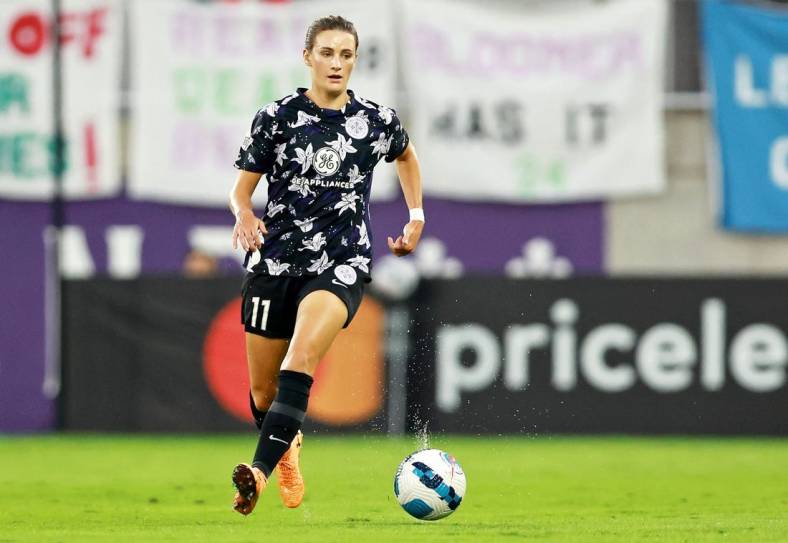 Sep 16, 2022; Louisville, Kentucky, USA; Racing Louisville FC midfielder Savannah DeMelo (7) dribbles the ball against the Orlando Pride during the first half at Lynn Family Stadium. Mandatory Credit: EM Dash-USA TODAY Sports