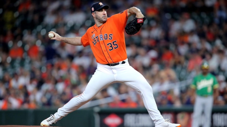 Sep 16, 2022; Houston, Texas, USA; Houston Astros starting pitcher Justin Verlander (35) delivers a pitch against the Oakland Athletics during the first inning at Minute Maid Park. Mandatory Credit: Erik Williams-USA TODAY Sports