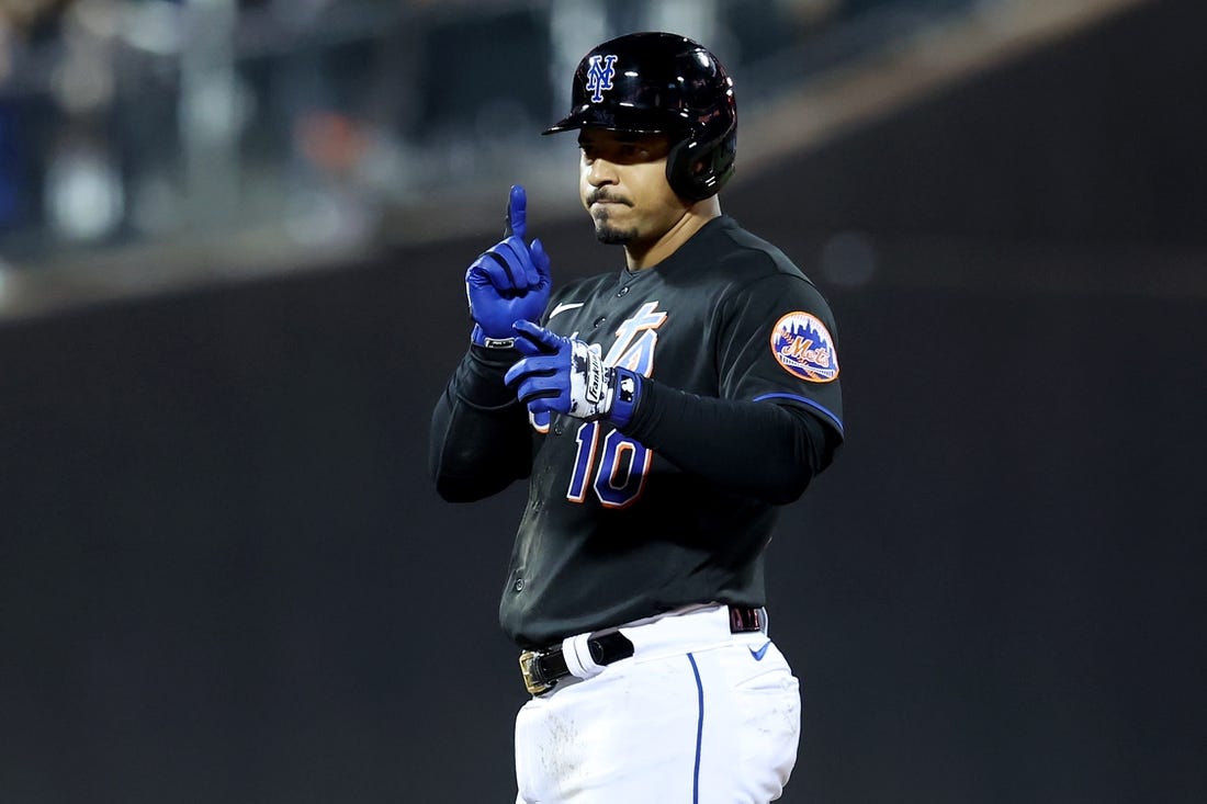 Sep 16, 2022; New York City, New York, USA; New York Mets third baseman Eduardo Escobar (10) reacts after hitting a double against the Pittsburgh Pirates during the seventh inning at Citi Field. Mandatory Credit: Brad Penner-USA TODAY Sports