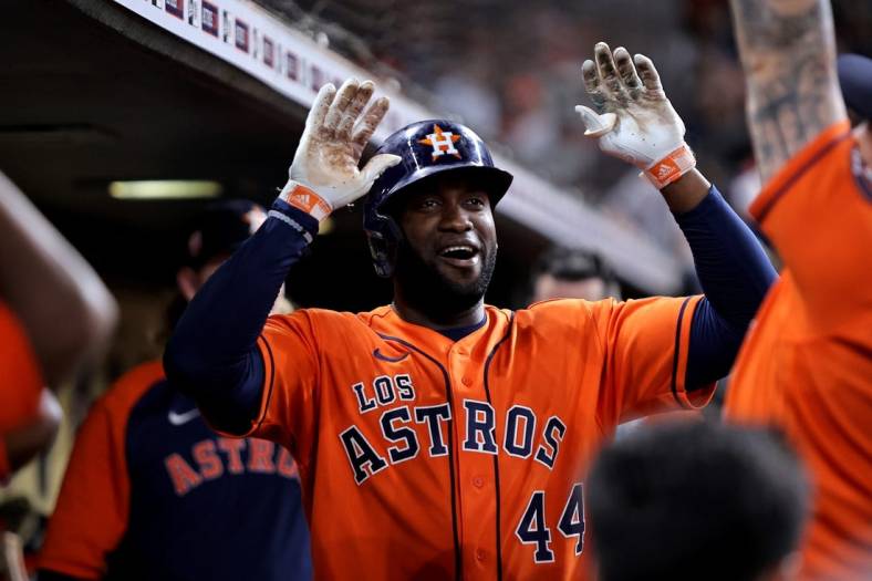 Sep 16, 2022; Houston, Texas, USA; Houston Astros left fielder Yordan Alvarez (44) is greeted after hitting a home run to center field against the Oakland Athletics during the third inning at Minute Maid Park. Mandatory Credit: Erik Williams-USA TODAY Sports