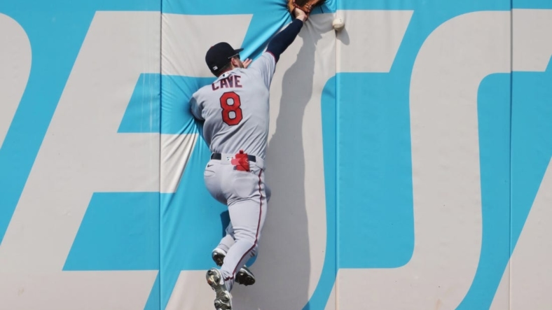 Sep 17, 2022; Cleveland, Ohio, USA; Minnesota Twins left fielder Jake Cave (8) misses a ball hit by Cleveland Guardians second baseman Andres Gimenez (not pictured) during the fourth inning at Progressive Field. Mandatory Credit: Ken Blaze-USA TODAY Sports