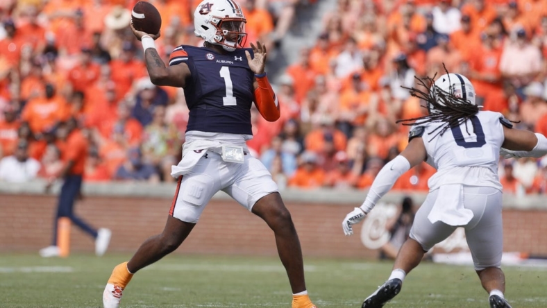 Sep 17, 2022; Auburn, Alabama, USA; Auburn Tigers quarterback T.J. Finley (1) throws a pass against the Penn State Nittany Lions during the first quarter at Jordan-Hare Stadium. Mandatory Credit: John Reed-USA TODAY Sports
