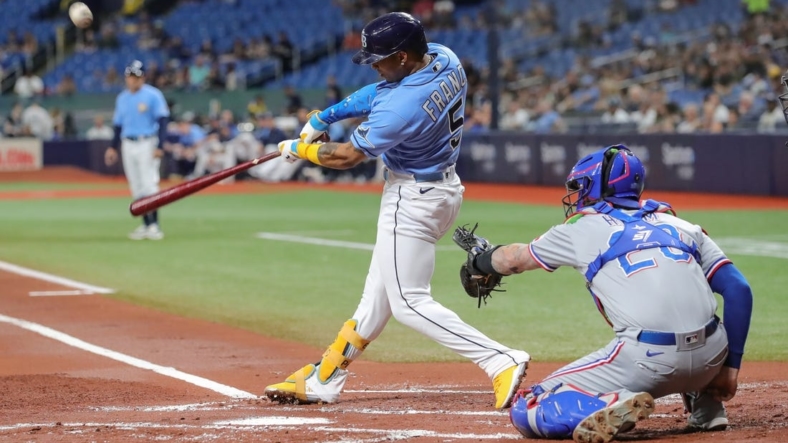 Sep 17, 2022; St. Petersburg, Florida, USA; Tampa Bay Rays shortstop Wander Franco (5) at bat during the first inning against the Texas Rangers at Tropicana Field. Mandatory Credit: Mike Watters-USA TODAY Sports