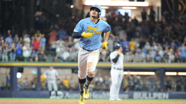 Sep 17, 2022; Milwaukee, Wisconsin, USA;  Milwaukee Brewers shortstop Willy Adames (27) rounds the bases after hitting a home run against the New York Yankees in the third inning at American Family Field. Mandatory Credit: Michael McLoone-USA TODAY Sports