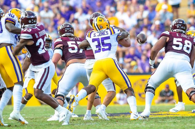 Sa'vion Jones sacks Quarterback Will Rogers and causes a fumble as the LSU Tigers take on the Mississippi State Bulldogs at Tiger Stadium in Baton Rouge, Louisiana, USA. Saturday, Sept. 17, 2022.

Lsu Vs Miss State Football 0727

Syndication The Daily Advertiser