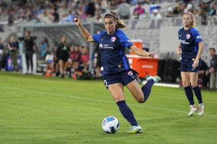 Sep 17, 2022; San Diego, California, USA; San Diego Wave FC forward Alex Morgan (13) passes the ball against Angel City FC in the first half at Snapdragon Stadium. Mandatory Credit: Ray Acevedo-USA TODAY Sports