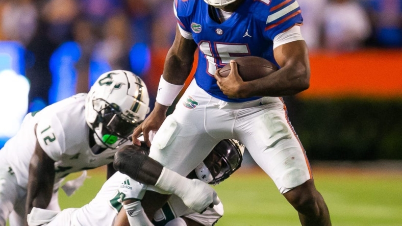 Florida Gators quarterback Anthony Richardson (15) is brought down in the second half against the Bulls at Steve Spurrier Field at Ben Hill Griffin Stadium in Gainesville, FL on Saturday, September 17, 2022. Florida won 31-28 [Doug Engle/Gainesville Sun]Ncaa Football Florida Gators Vs Usf Bulls