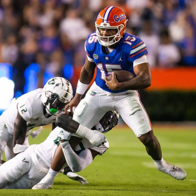 Florida Gators quarterback Anthony Richardson (15) is brought down in the second half against the Bulls at Steve Spurrier Field at Ben Hill Griffin Stadium in Gainesville, FL on Saturday, September 17, 2022. Florida won 31-28 [Doug Engle/Gainesville Sun]

Ncaa Football Florida Gators Vs Usf Bulls