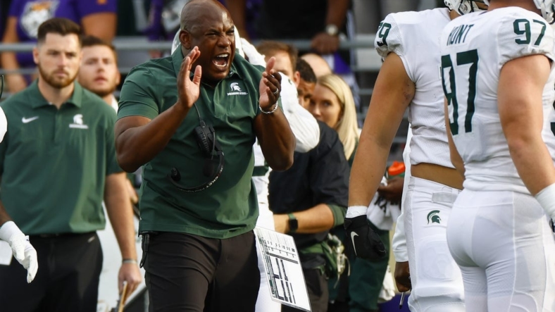 Sep 17, 2022; Seattle, Washington, USA; Michigan State Spartans head coach Mel Tucker reacts to a fourth down stop against the Washington Huskies during the first quarter at Alaska Airlines Field at Husky Stadium. Mandatory Credit: Joe Nicholson-USA TODAY Sports