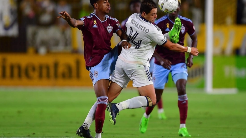 Sep 17, 2022; Carson, California, USA; Colorado Rapids midfielder Max (8) plays for the ball against Los Angeles Galaxy forward Javier Hernandez (14) during the second half at Dignity Health Sports Park. Mandatory Credit: Gary A. Vasquez-USA TODAY Sports