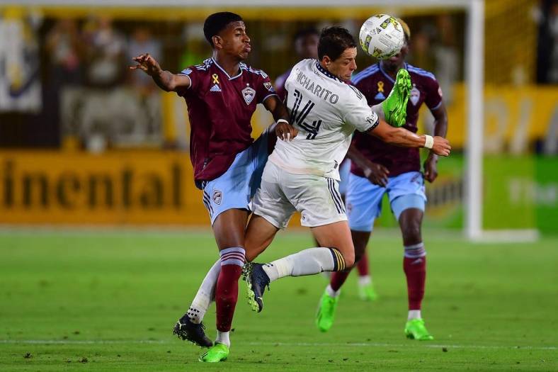 Sep 17, 2022; Carson, California, USA; Colorado Rapids midfielder Max (8) plays for the ball against Los Angeles Galaxy forward Javier Hernandez (14) during the second half at Dignity Health Sports Park. Mandatory Credit: Gary A. Vasquez-USA TODAY Sports