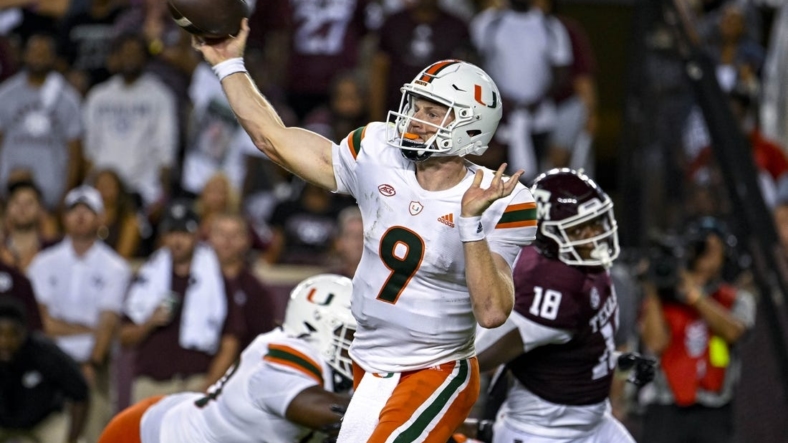 Sep 17, 2022; College Station, Texas, USA; Miami Hurricanes quarterback Tyler Van Dyke (9) passes against the Texas A&M Aggies during the second half at Kyle Field. Mandatory Credit: Jerome Miron-USA TODAY Sports