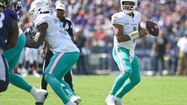 Sep 18, 2022; Baltimore, Maryland, USA;  Miami Dolphins quarterback Tua Tagovailoa (1) looks to throw during the first half against the Baltimore Ravens at M&T Bank Stadium. Mandatory Credit: Tommy Gilligan-USA TODAY Sports
