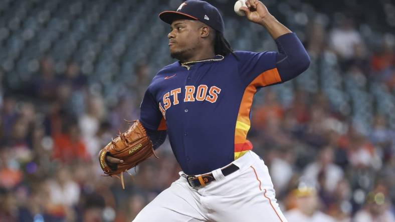 Sep 18, 2022; Houston, Texas, USA; Houston Astros starting pitcher Framber Valdez (59) delivers a pitch during the first inning against the Oakland Athletics at Minute Maid Park. Mandatory Credit: Troy Taormina-USA TODAY Sports