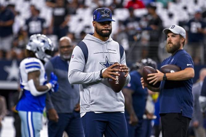 Cowboys QB Dak Prescott does work with training ball