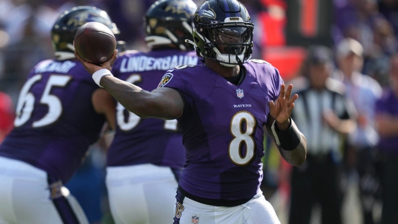 Sep 18, 2022; Baltimore, Maryland, USA; Baltimore Ravens  quarterback Lamar Jackson (8) passes in the fourth quarter against the Miami Dolphins at M&T Bank Stadium. Mandatory Credit: Mitch Stringer-USA TODAY Sports