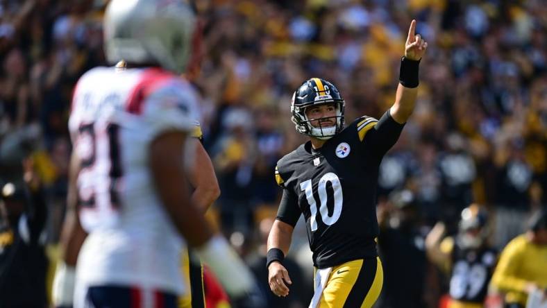 Sep 18, 2022; Pittsburgh, Pennsylvania, USA; Pittsburgh Steelers quarterback Mitch Trubisky (10) celebrates after scoring a touchdown during the fourth quarter against the New England Patriots at Acrisure Stadium. Mandatory Credit: David Dermer-USA TODAY Sports