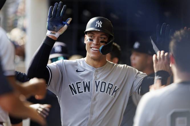 New York Yankees' Tyler Wade (14) celebrates with teammates after