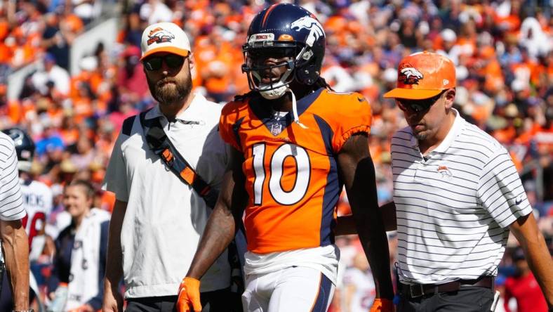 Sep 18, 2022; Denver, Colorado, USA; Denver Broncos wide receiver Jerry Jeudy (10) leaves the field in the first quarter against the Denver Broncos at Empower Field at Mile High. Mandatory Credit: Ron Chenoy-USA TODAY Sports