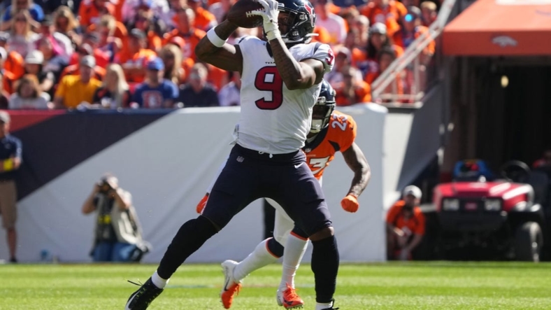 Sep 18, 2022; Denver, Colorado, USA; Houston Texans tight end Brevin Jordan (9) catches the ball in the second quarter against the Denver Broncos at Empower Field at Mile High. Mandatory Credit: Ron Chenoy-USA TODAY Sports