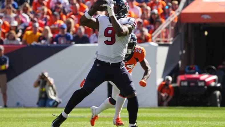 Sep 18, 2022; Denver, Colorado, USA; Houston Texans tight end Brevin Jordan (9) catches the ball in the second quarter against the Denver Broncos at Empower Field at Mile High. Mandatory Credit: Ron Chenoy-USA TODAY Sports