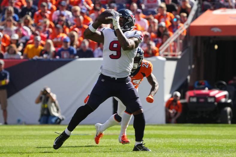 Sep 18, 2022; Denver, Colorado, USA; Houston Texans tight end Brevin Jordan (9) catches the ball in the second quarter against the Denver Broncos at Empower Field at Mile High. Mandatory Credit: Ron Chenoy-USA TODAY Sports