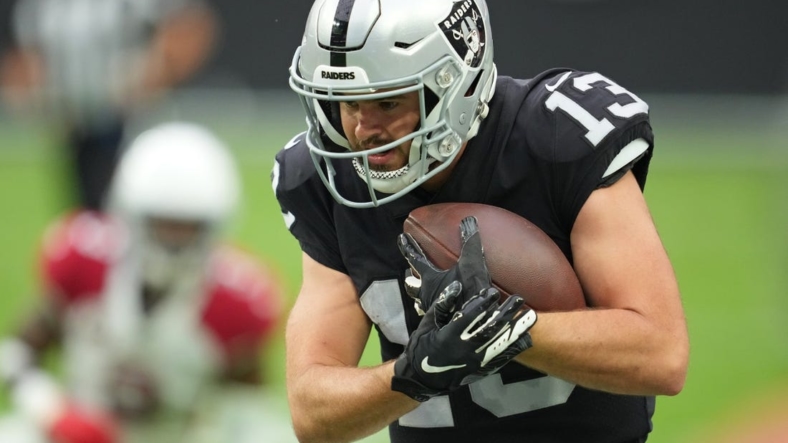 Sep 18, 2022; Paradise, Nevada, USA;Las Vegas Raiders wide receiver Hunter Renfrow (13) makes a catch against the Arizona Cardinals during a game at Allegiant Stadium. Mandatory Credit: Stephen R. Sylvanie-USA TODAY Sports