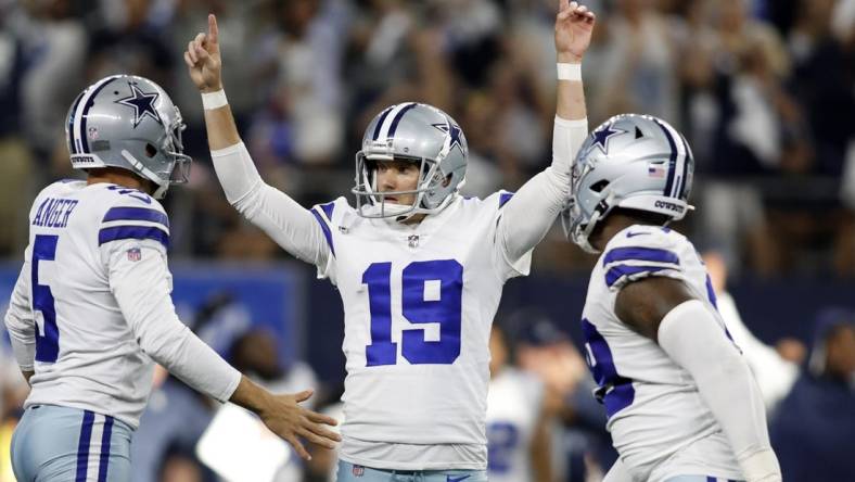 Sep 18, 2022; Arlington, Texas, USA;  Dallas Cowboys place kicker Brett Maher (19) and punter Bryan Anger (5) celebrate the game winning field goal at the end of the game against the Cincinnati Bengals at AT&T Stadium. Mandatory Credit: Tim Heitman-USA TODAY Sports