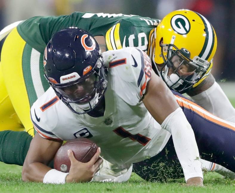Green Bay Packers linebacker Preston Smith (91) sacks Chicago Bears quarterback Justin Fields (1) during their football game on Sunday, September 18, 2022 at Lambeau Field. in Green Bay, Wis. Wm. Glasheen USA TODAY NETWORK-Wisconsin

Apc Pack Vs Bears 4284 091822wag
