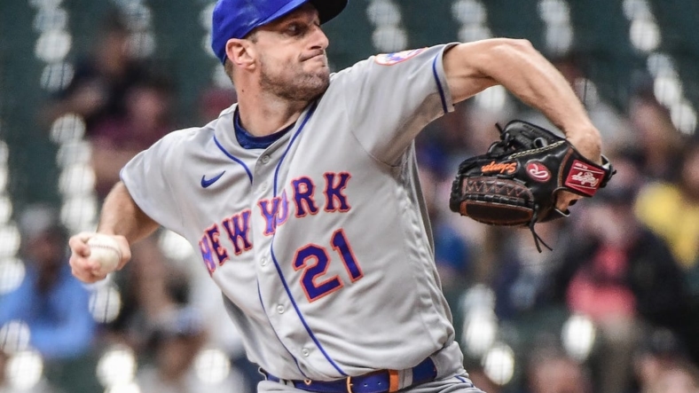 Sep 19, 2022; Milwaukee, Wisconsin, USA; New York Mets pitcher Max Scherzer (21) throws a pitch in the first inning against the Milwaukee Brewers at American Family Field. Mandatory Credit: Benny Sieu-USA TODAY Sports