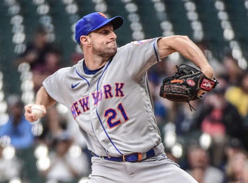 Sep 19, 2022; Milwaukee, Wisconsin, USA; New York Mets pitcher Max Scherzer (21) throws a pitch in the first inning against the Milwaukee Brewers at American Family Field. Mandatory Credit: Benny Sieu-USA TODAY Sports