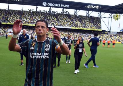 Sep 10, 2022; Nashville, Tennessee, USA; Los Angeles Galaxy forward Javier Hernandez (14) leaves the field after a tie against the Nashville SC at Geodis Park. Mandatory Credit: Christopher Hanewinckel-USA TODAY Sports