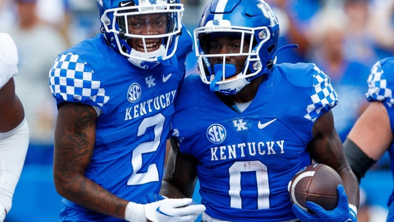 Sep 17, 2022; Lexington, Kentucky, USA; Kentucky Wildcats wide receiver Barion Brown (2) celebrates with running back Kavosiey Smoke (0) after a touchdown is scored during the game against the Youngstown State Penguins at Kroger Field. Mandatory Credit: Jordan Prather-USA TODAY Sports